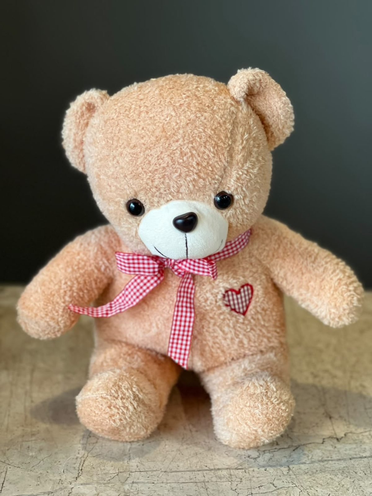 Beige color standing Teddy bear